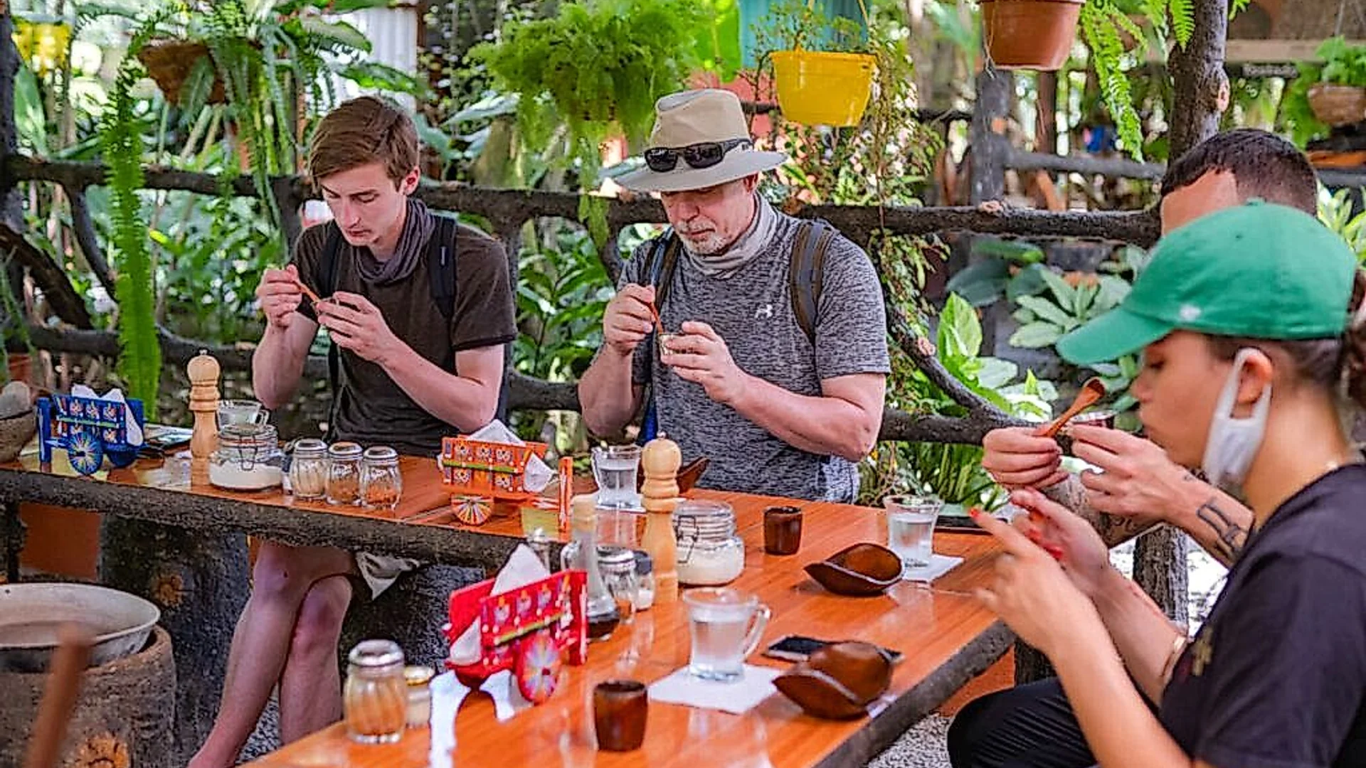Traditional process of crafting artisanal chocolate on a farm in La Fortuna.